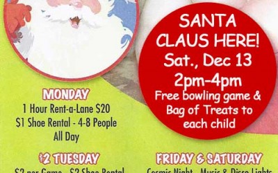 Santa Claus arrives at Cedar Bowling Center